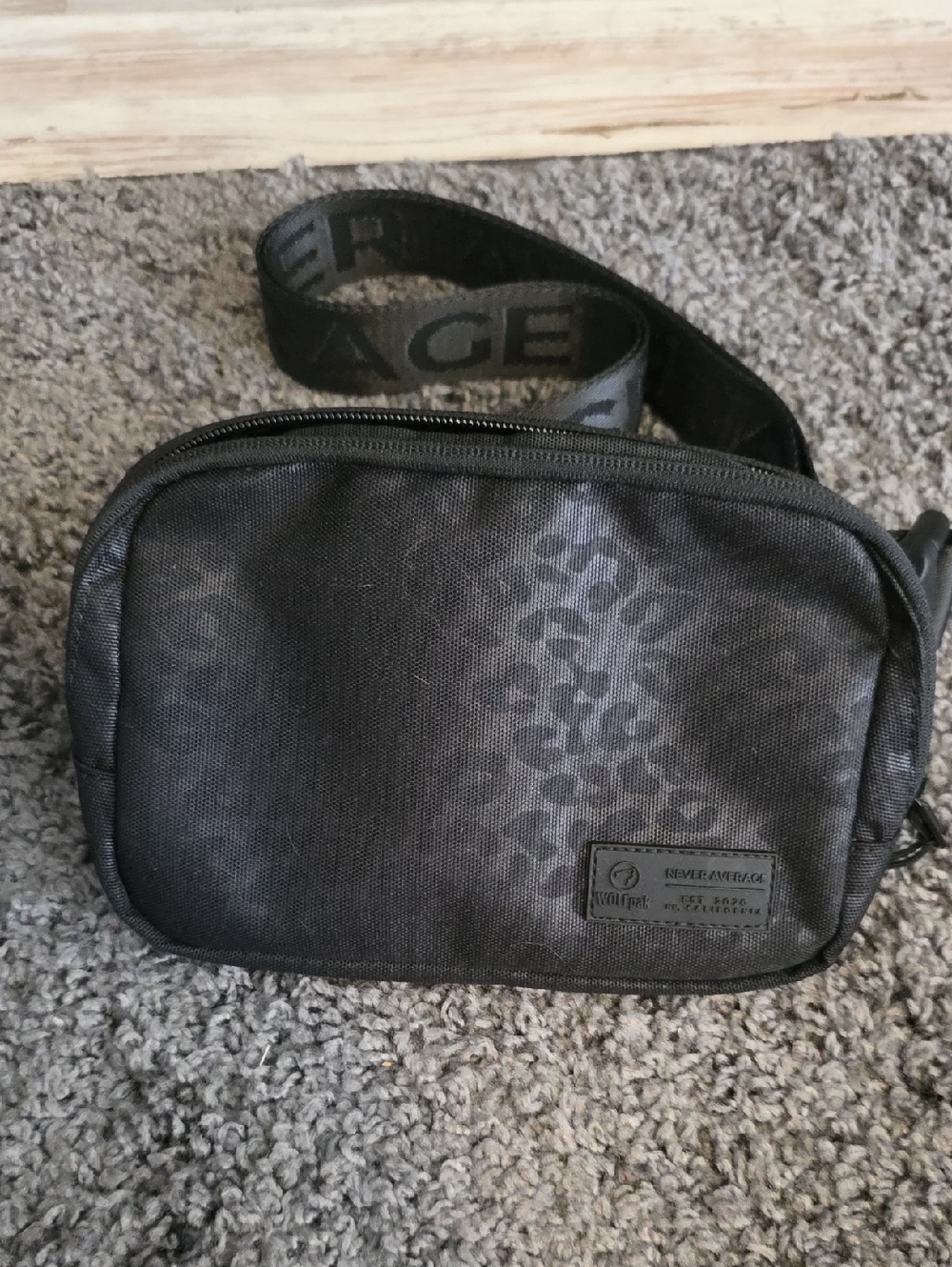 Black Crossbody Bag with Subtle Pattern